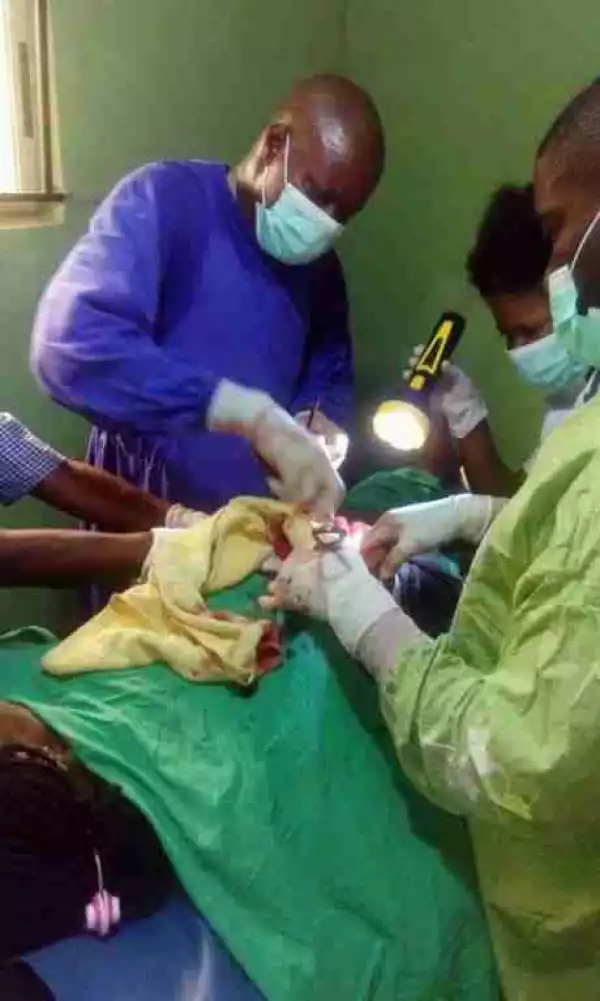 So Sad!! See How This Woman Is Being Treated With Torchlight After Church Attack In Ozubulu (Graphics Photo)